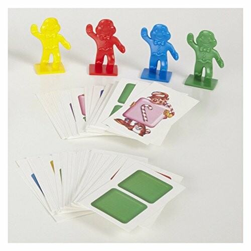 Candyland game pieces and cards on a table.