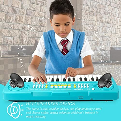 Child playing a blue keyboard with built-in speakers.