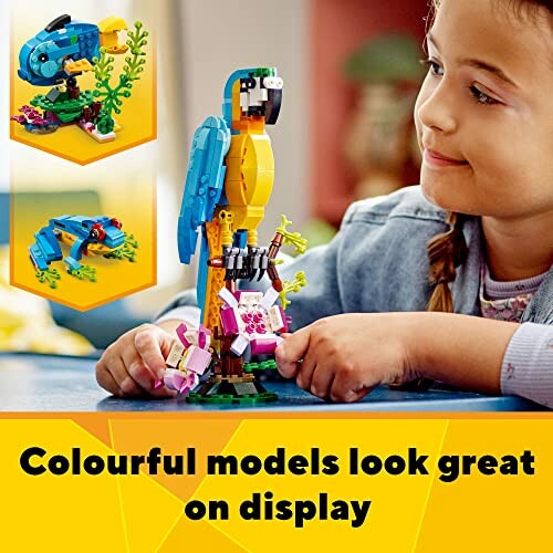 Child playing with a parrot LEGO model and other colorful LEGO models in the background.