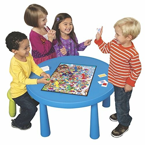Children playing a board game around a blue table.