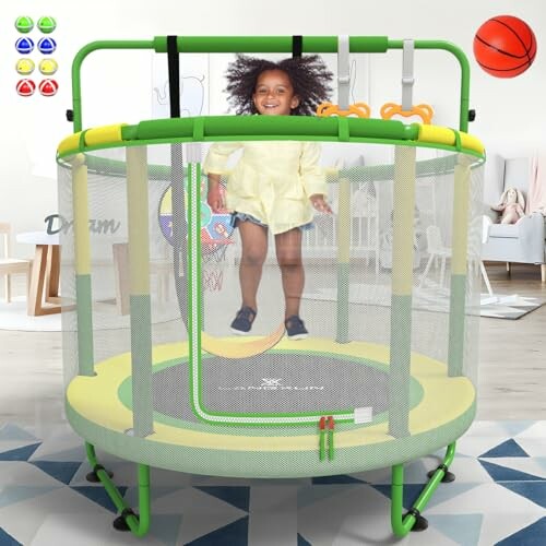 Child jumping on an indoor trampoline with safety net.