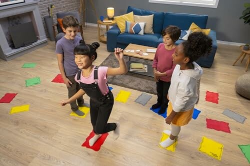 Children playing a colorful indoor game on a wooden floor.