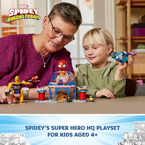 Adult and child playing with Spidey super hero HQ playset.
